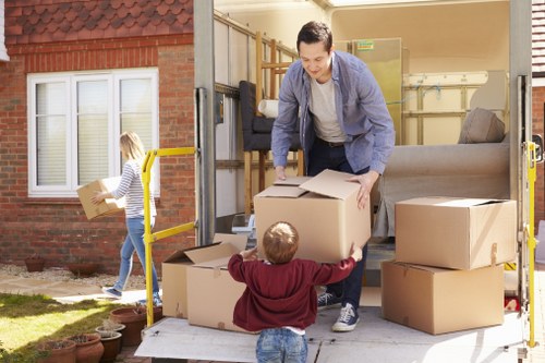 Removal team helping with a house move in Coombe