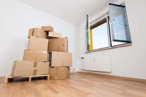 Local removals team handling a house move in Coombe