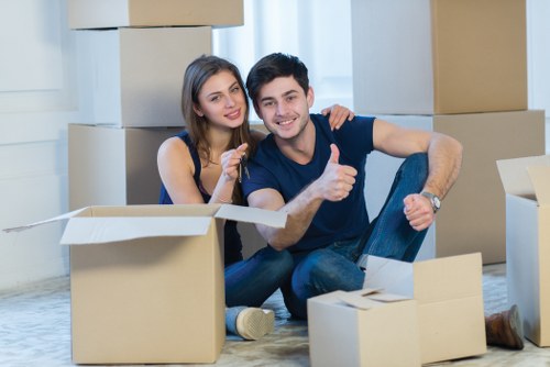 Careful handling of household items by a van service in Coombe