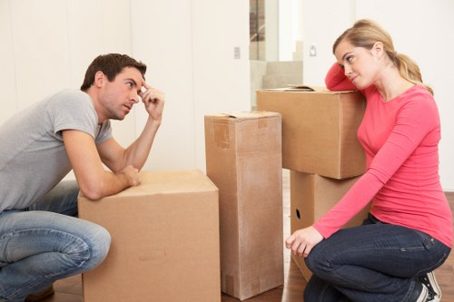 Professional packing service preparing fragile belongings for transport