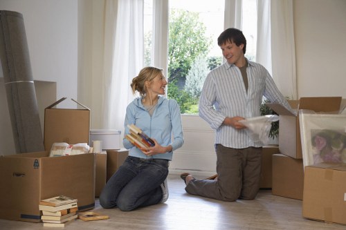 Trained movers handling belongings carefully during a Coombe removal
